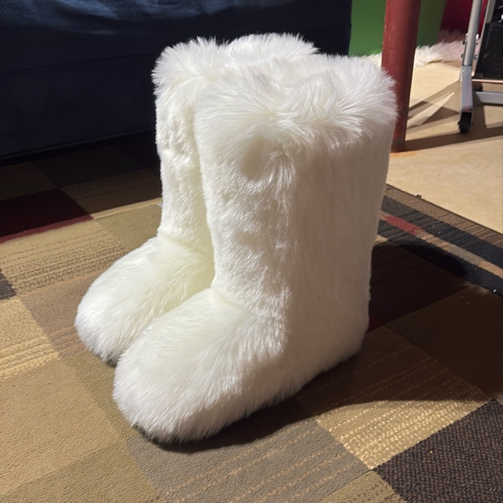 White furry boots. NWOT